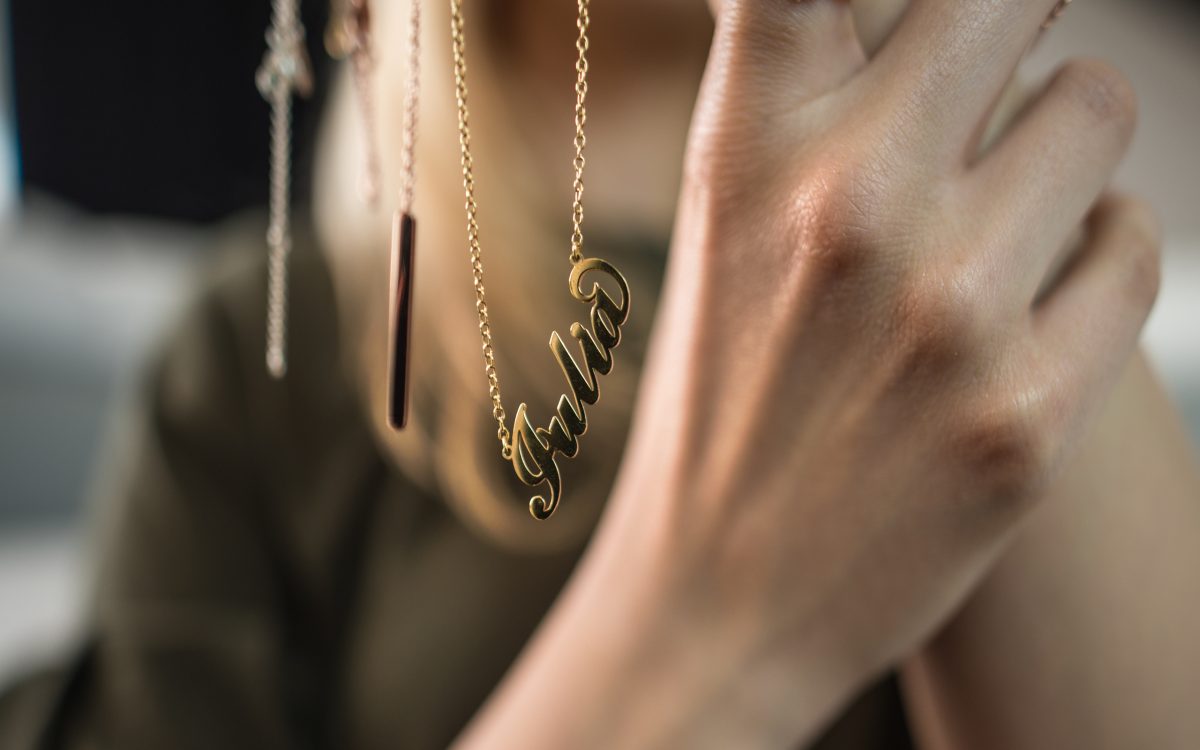 Woman showcasing jewelry on her hands